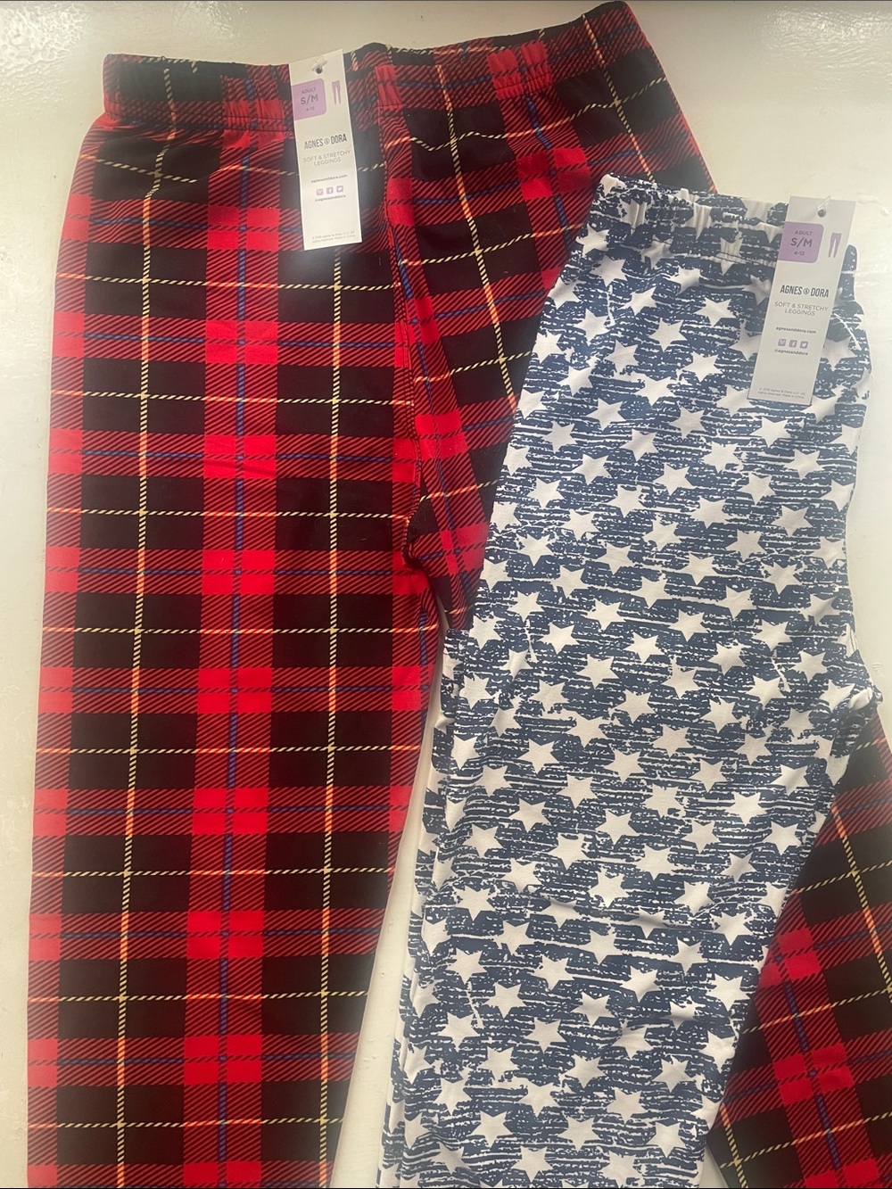 Two pairs Agnes & Dora S/M adult leggings fit US sizes 4-12. New with Tags
